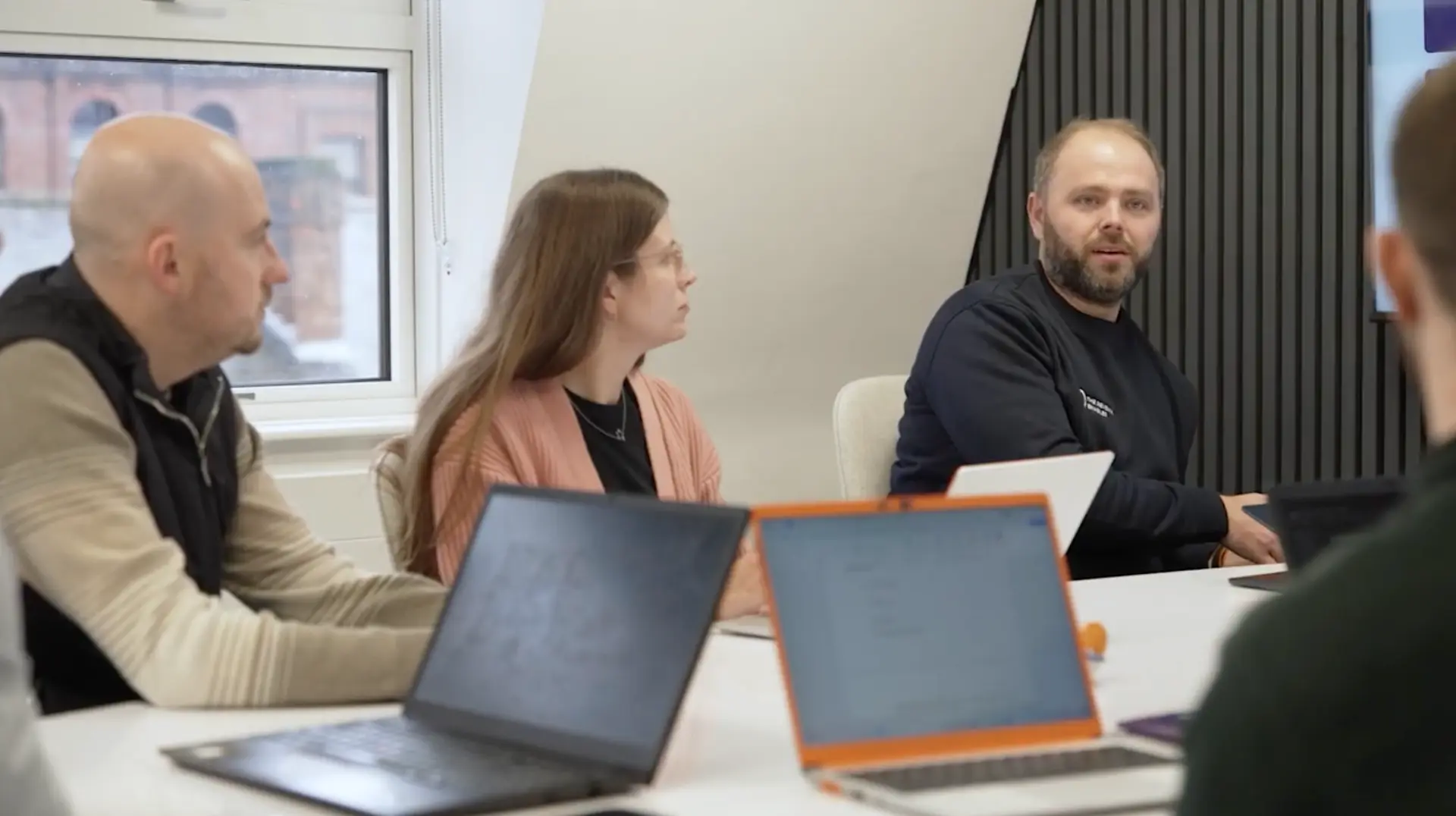 Group coaching session with a B2B sales team